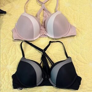 Victoria's Secret racer back Women's Black and tan bras 34B like new